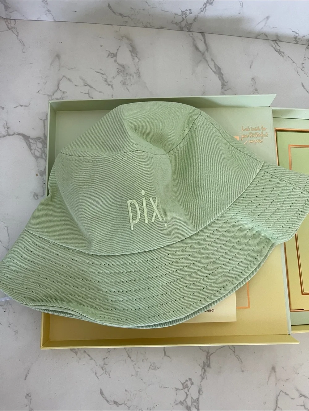 Pixi AfterSun Skincare Set with Mint Green Hat and Cleansing Oil